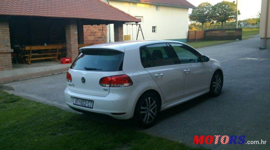2011' Volkswagen Golf VI 1,6 Tdi photo #1
