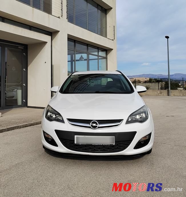 2014' Opel Astra Karavan photo #1