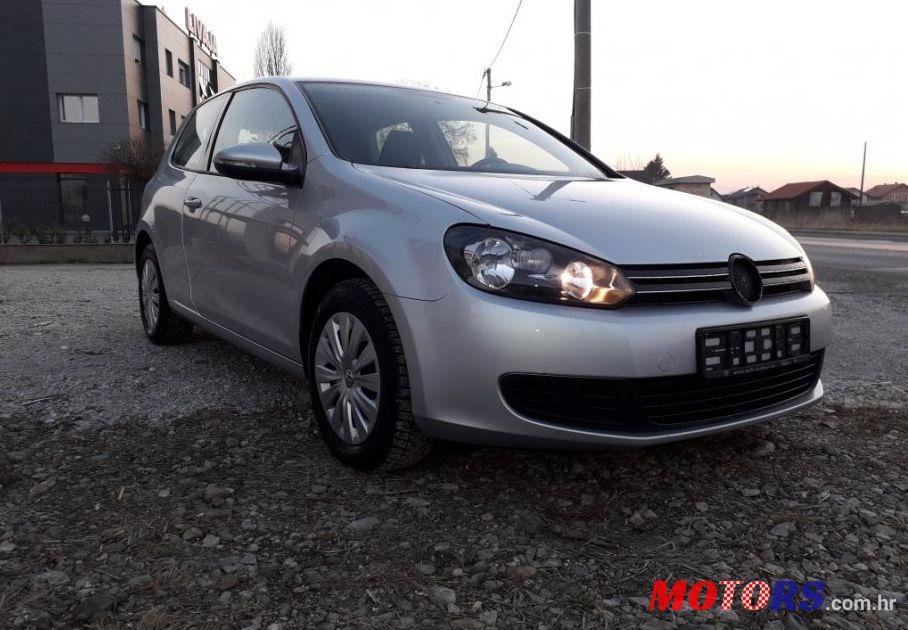 2011' Volkswagen Golf VI 1,6 Tdi photo #1