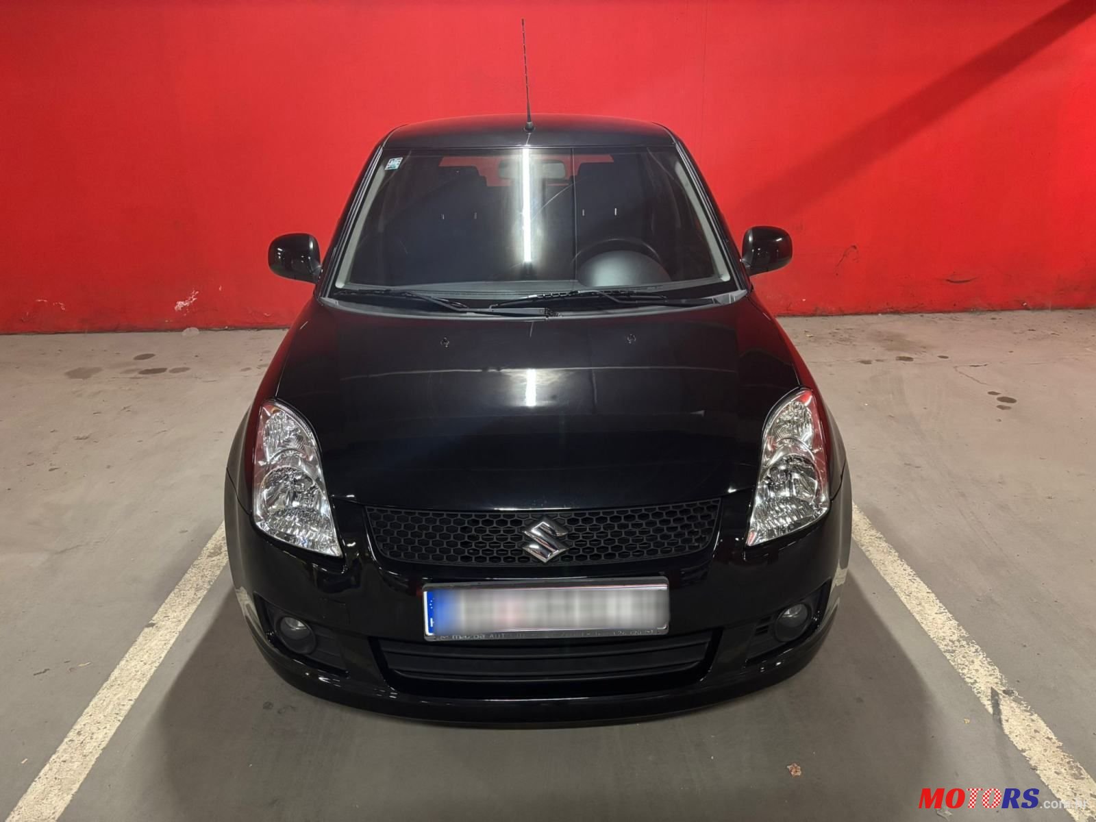 2009' Suzuki Swift 1,3 Glx photo #2