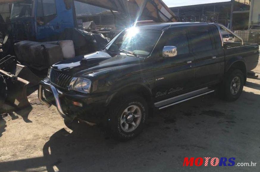 2004' Mitsubishi L200 Mk 2 American Sport photo #2