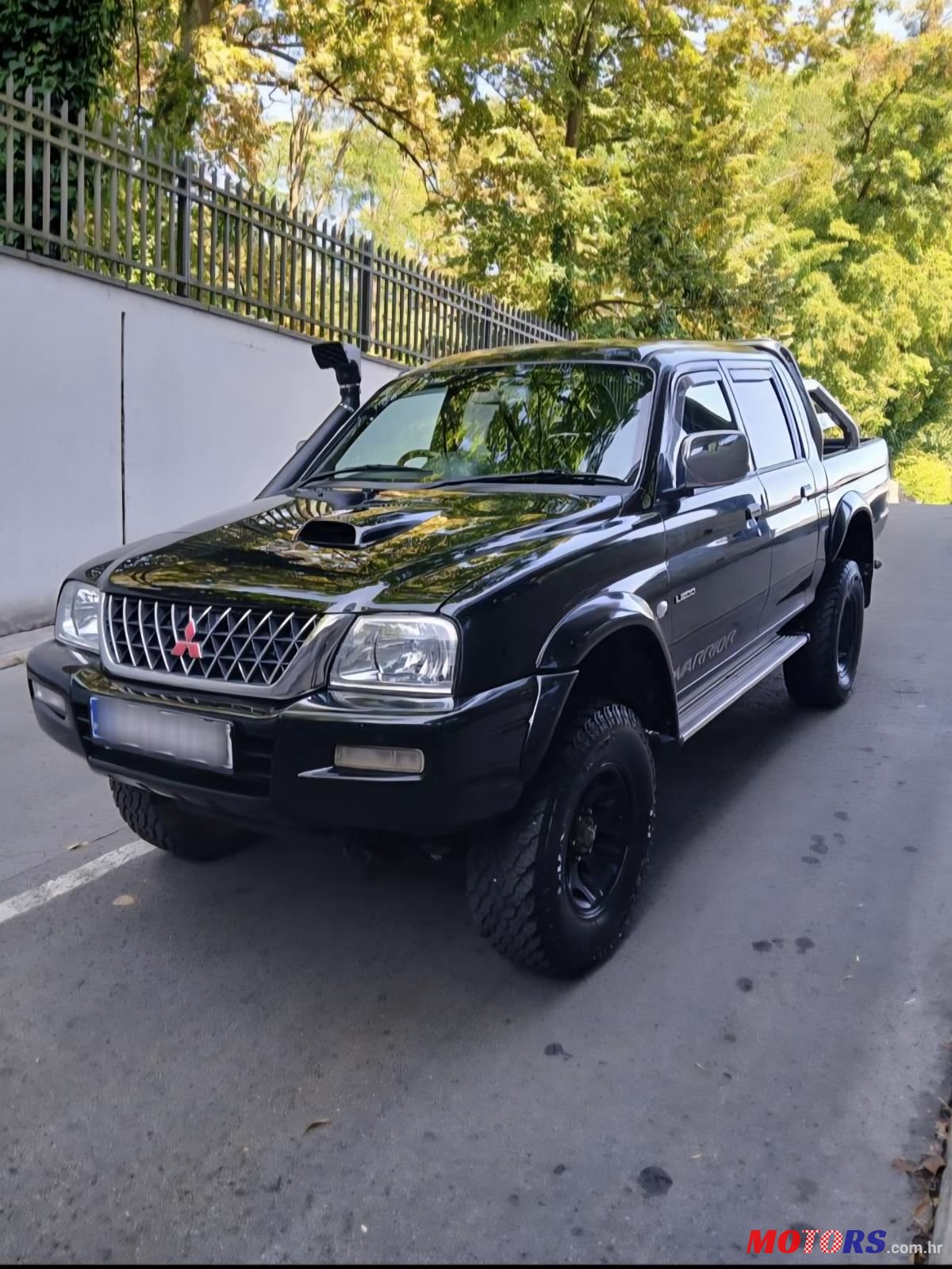 2003' Mitsubishi L200 Warrior photo #2