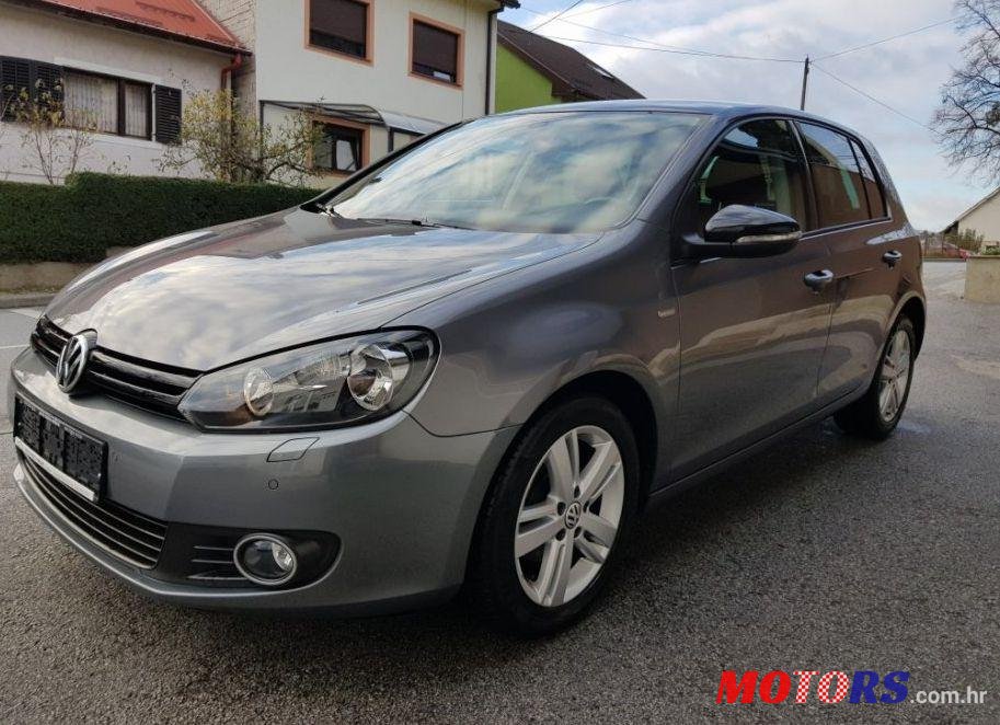 2012' Volkswagen Golf VI 1,6 Tdi photo #1