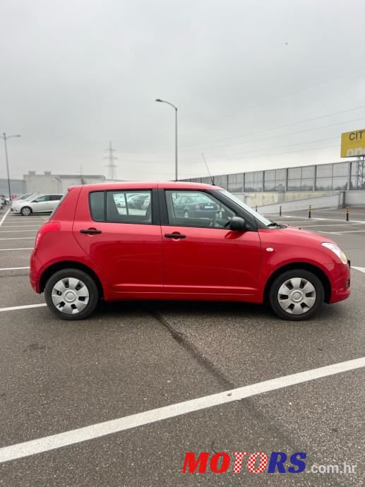 2009' Suzuki Swift 1,3 photo #4