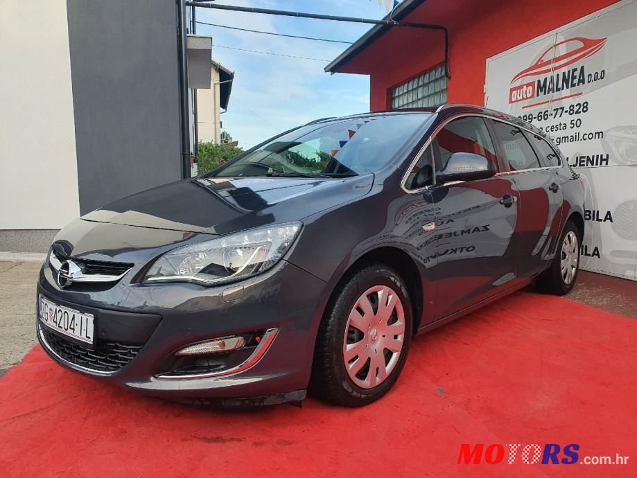 2013' Opel Astra Karavan photo #2