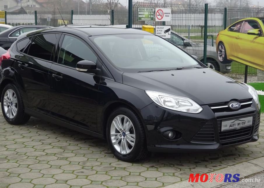 2011' Ford Focus 1,6 photo #1