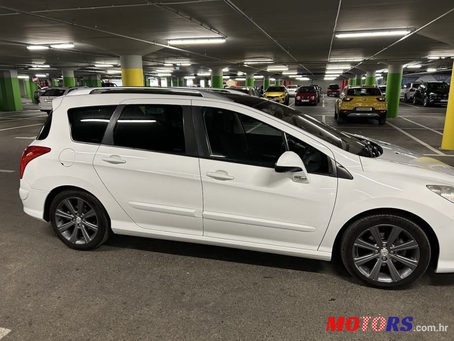 2011' Peugeot 308 Sw photo #5