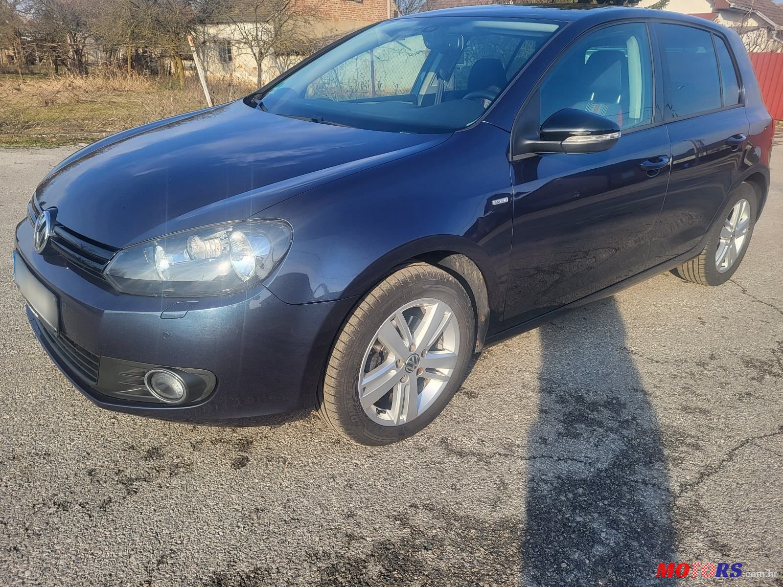 2012' Volkswagen Golf VI 1,6 Tdi photo #4