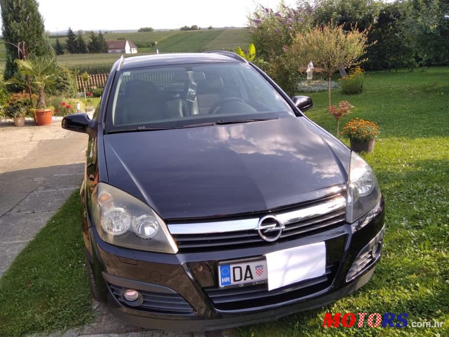 2006' Opel Astra Karavan photo #1