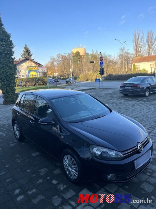 2011' Volkswagen Golf VI 1,6 Tdi photo #3