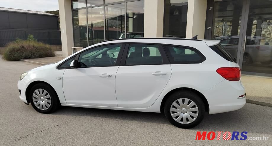 2014' Opel Astra Karavan photo #3