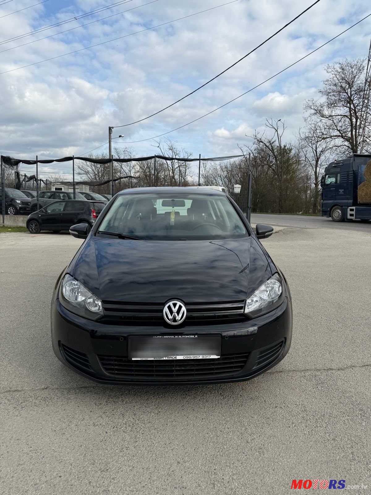 2009' Volkswagen Golf VI 1,6 Tdi photo #3