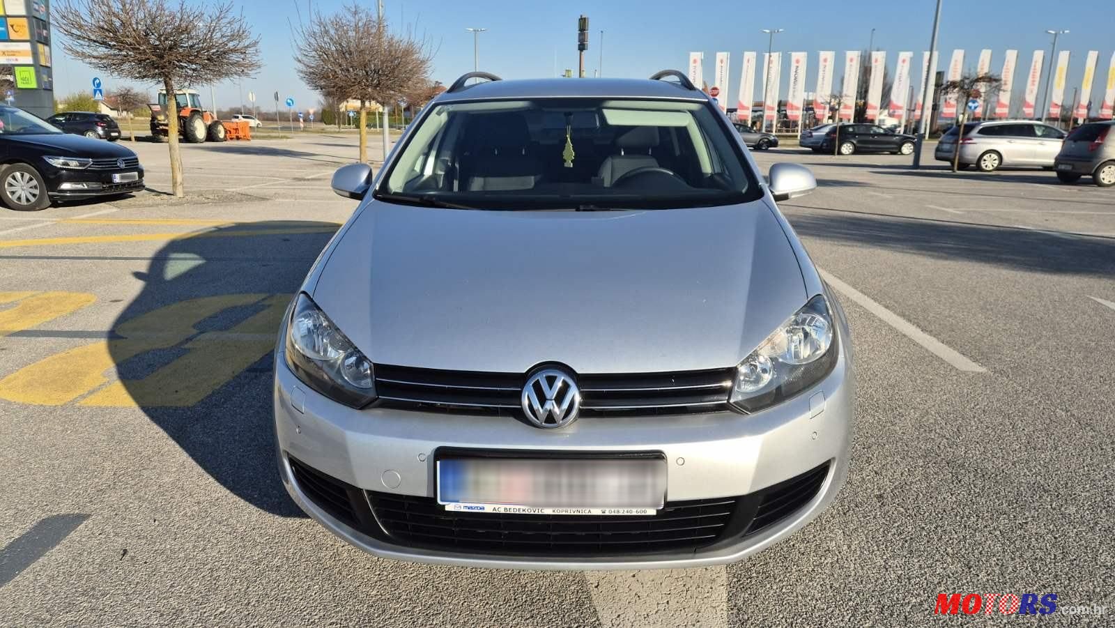 2011' Volkswagen Golf VI Variant photo #5