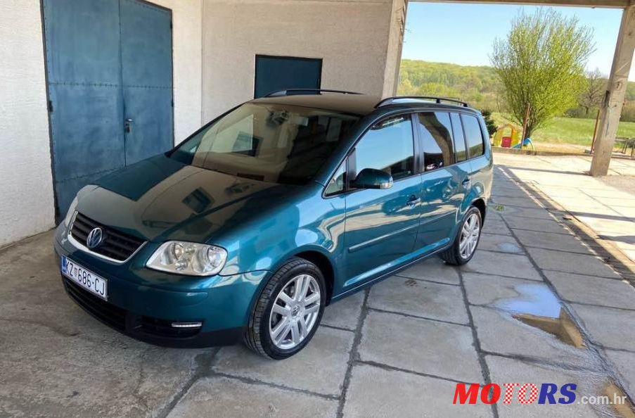 2004' Volkswagen Touran 1,9 Tdi photo #1