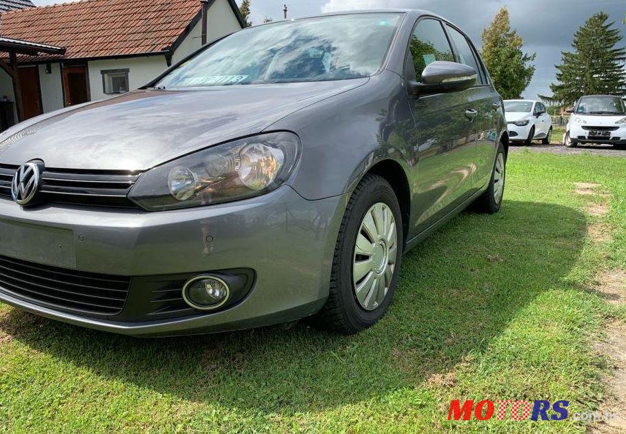 2012' Volkswagen Golf VI 1,6 Tdi photo #1