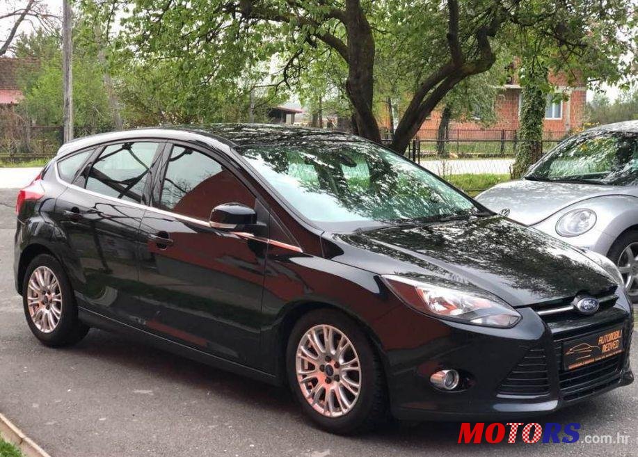 2011' Ford Focus 1,6 photo #1