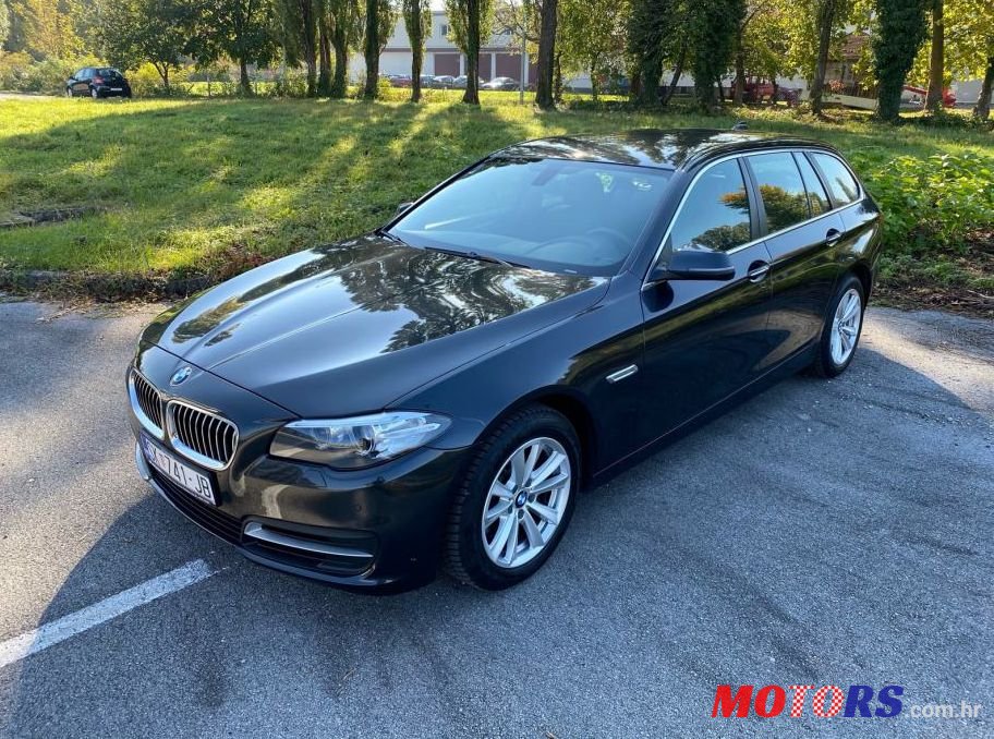 2015' BMW Serija 5 Touring 520D photo #1