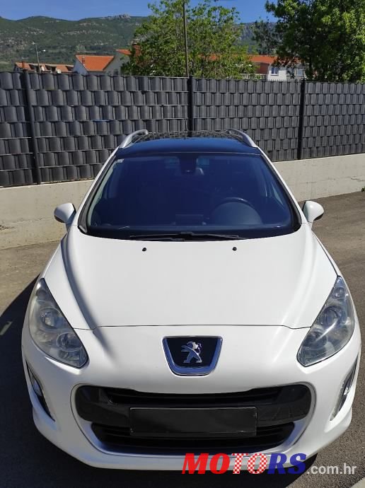 2014' Peugeot 308 Sw photo #3