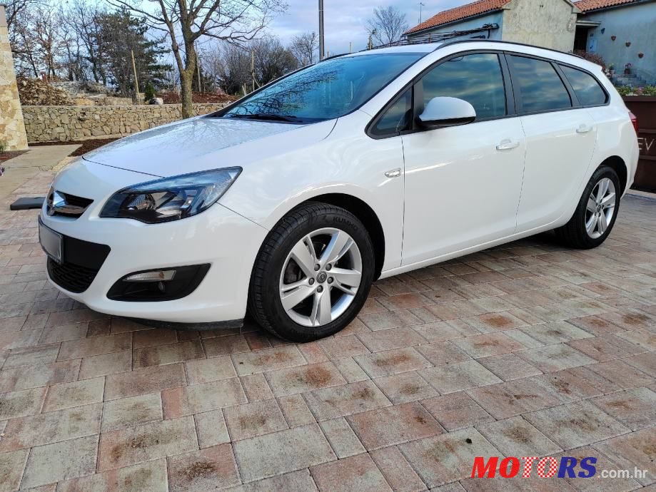 2014' Opel Astra Karavan photo #1