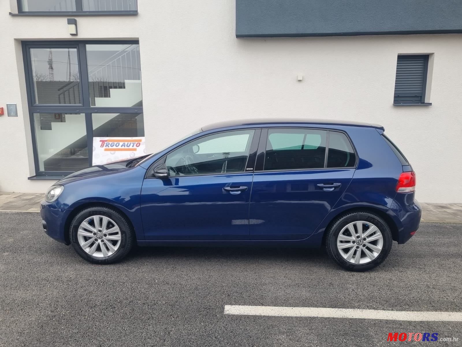 2012' Volkswagen Golf VI 1,6 Tdi photo #2