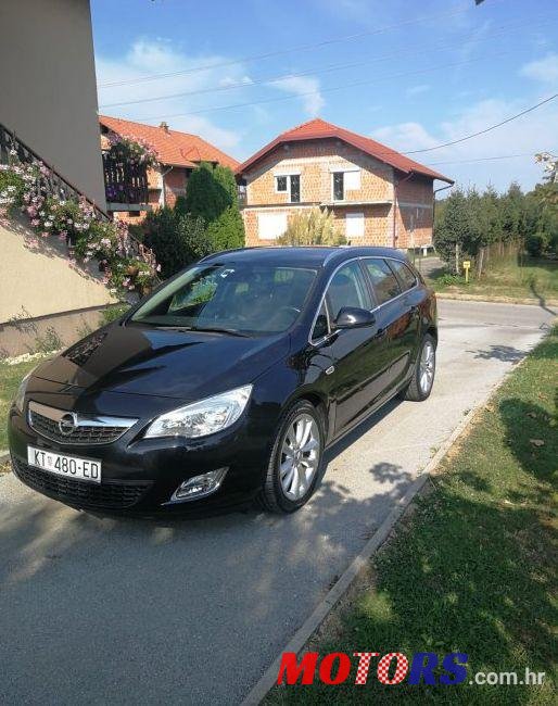 2011' Opel Astra Karavan photo #1