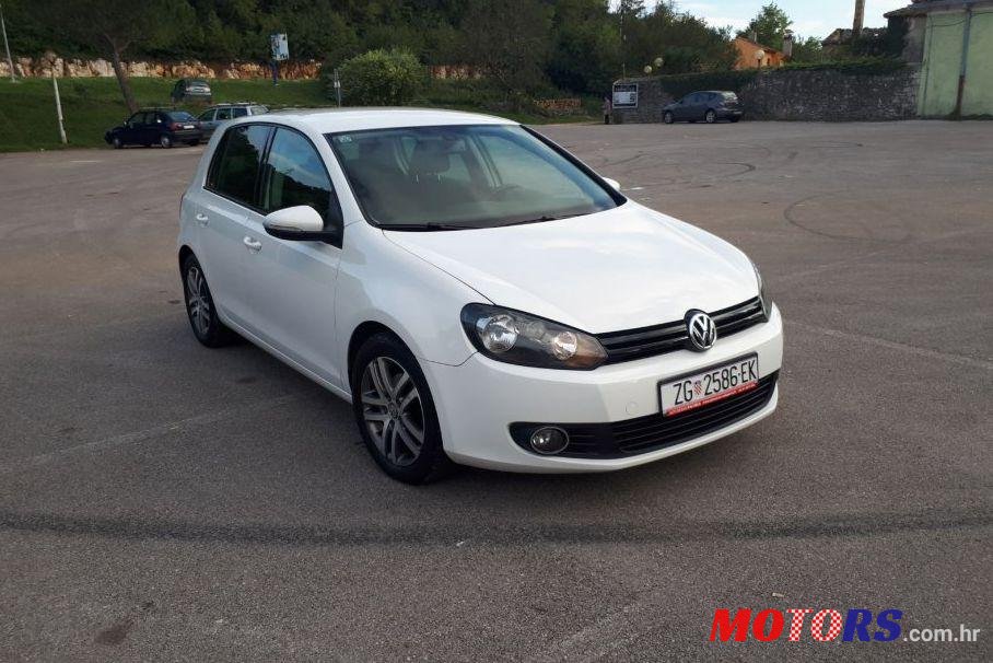 2011' Volkswagen Golf VI 1,6 Tdi photo #1