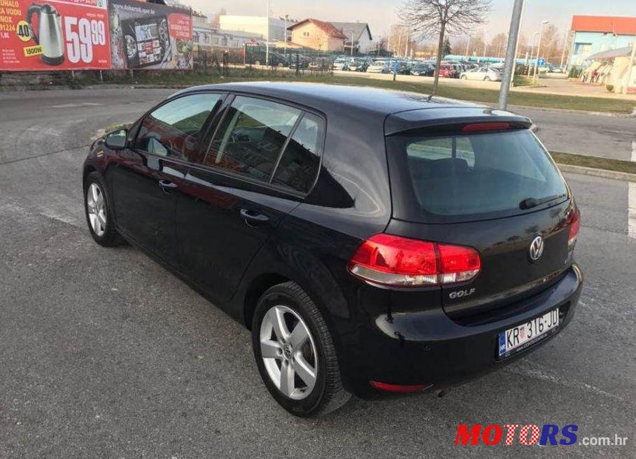 2011' Volkswagen Golf VI 1,6 Tdi photo #1