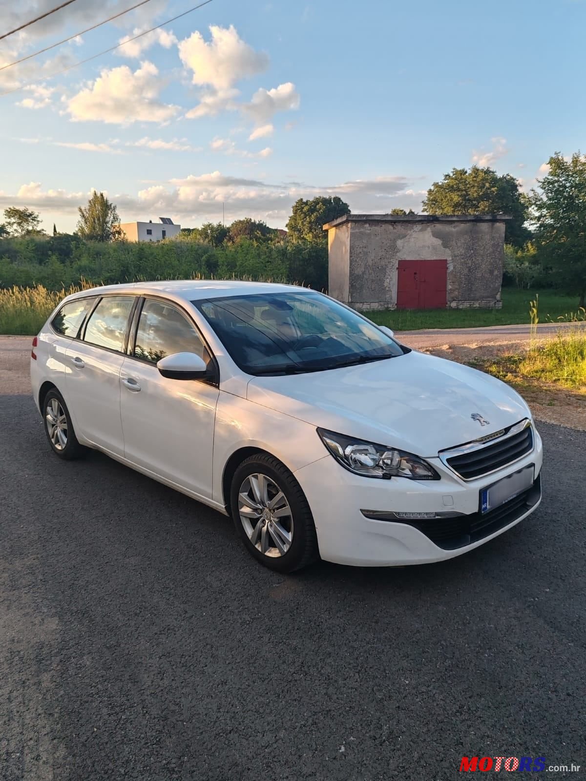 2014' Peugeot 308 Sw photo #1