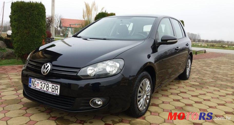 2009' Volkswagen Golf VI 1,6 Tdi photo #1