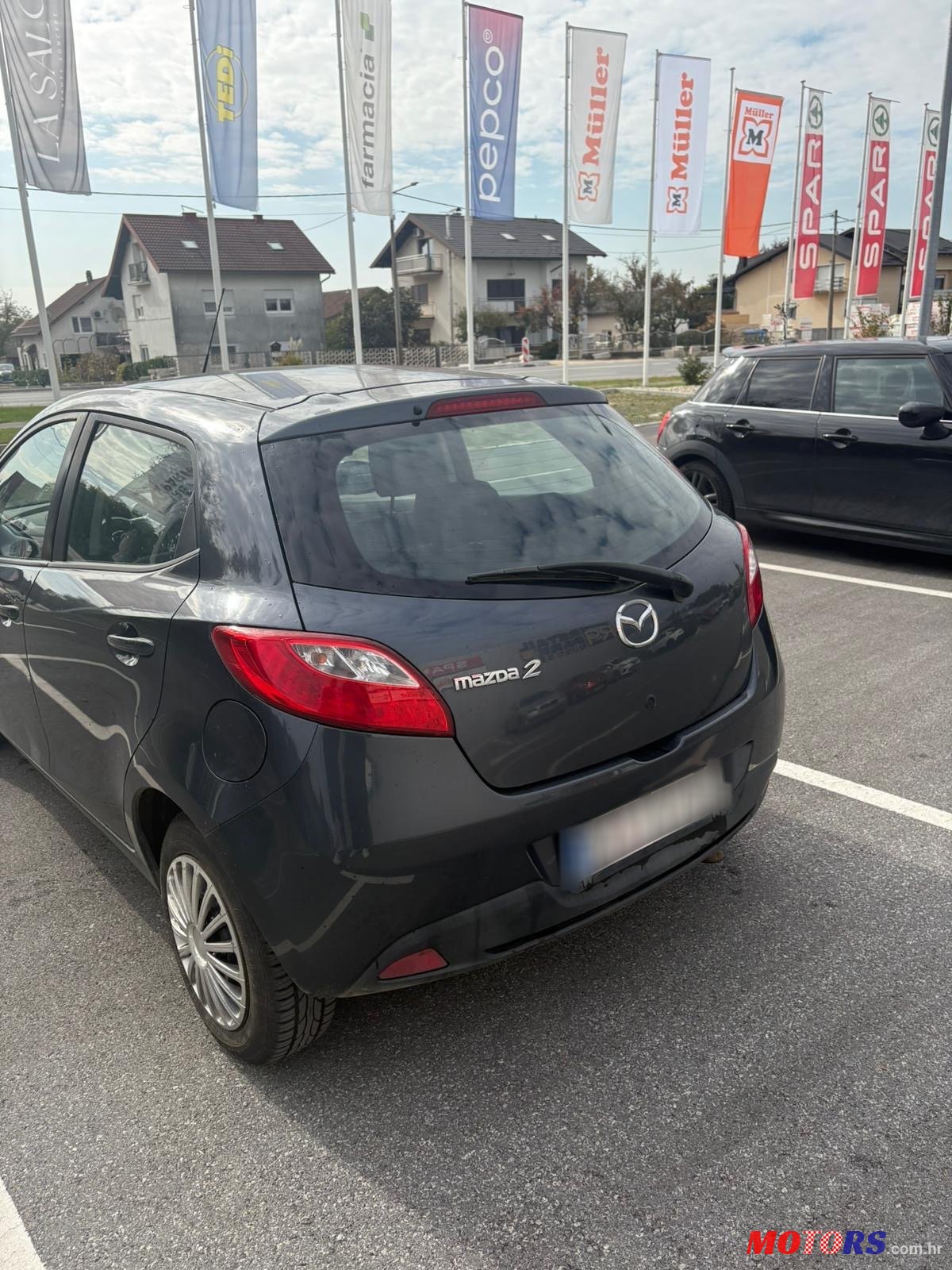 2008' Mazda 2 photo #5