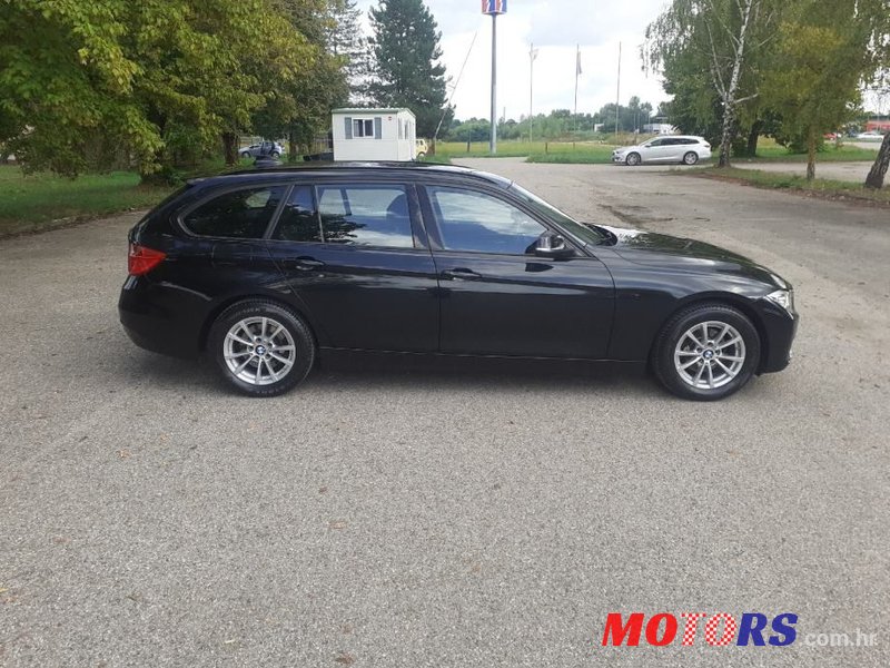 2014' BMW Serija 3 318D photo #6