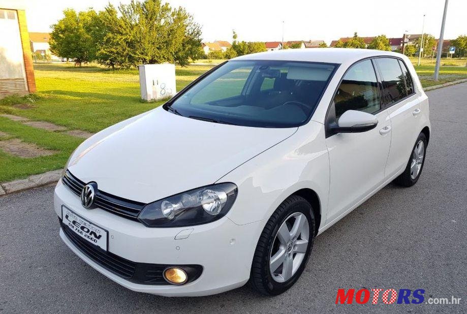 2011' Volkswagen Golf VI 1,6 Tdi photo #1