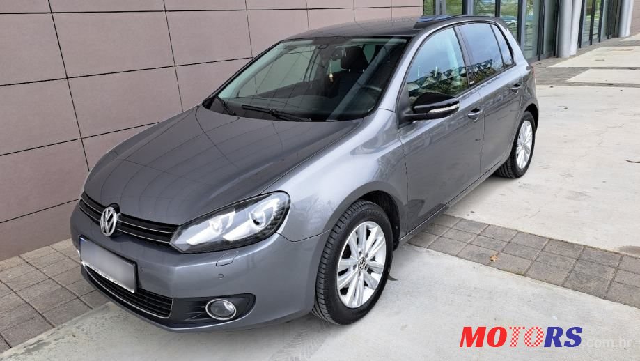2011' Volkswagen Golf VI 1,6 Tdi photo #2