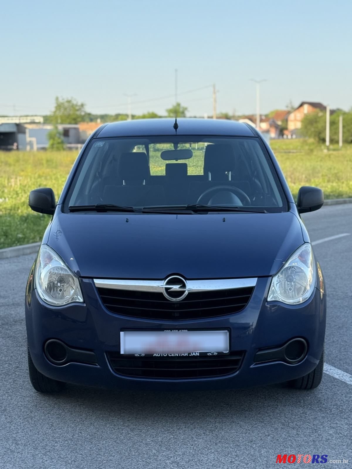 2009' Opel Agila 1,0 photo #2