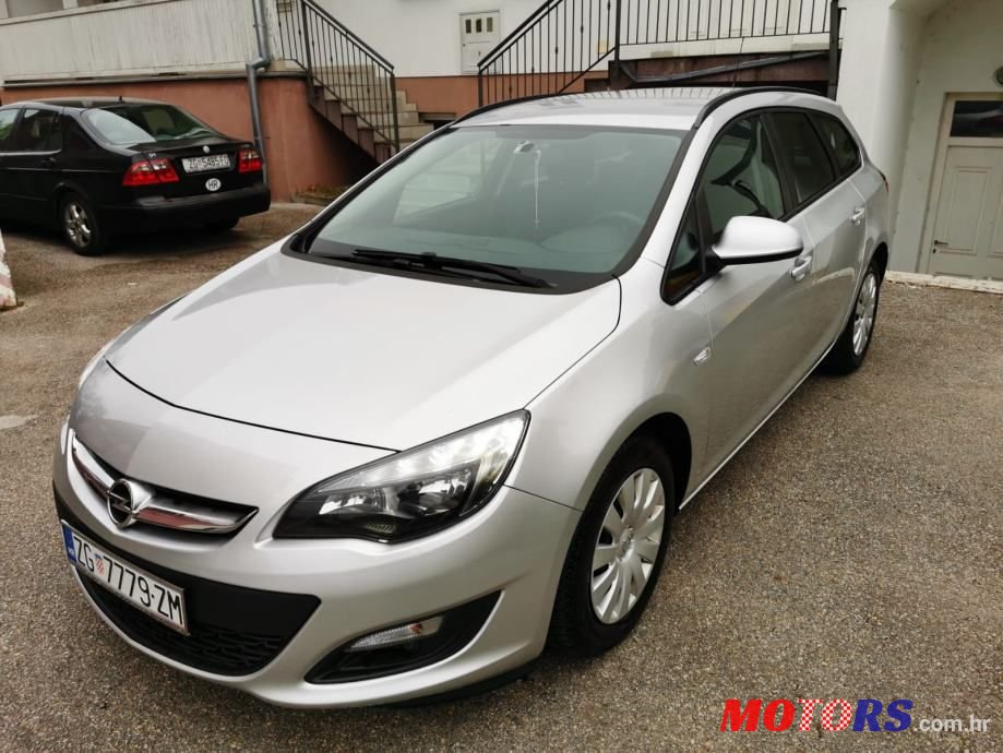 2014' Opel Astra Karavan photo #1