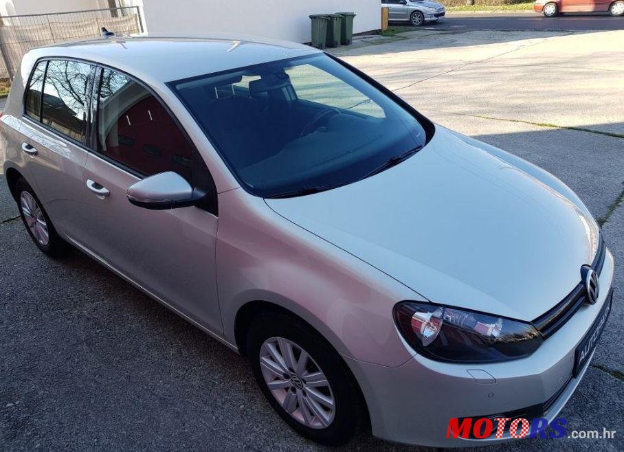 2012' Volkswagen Golf VI 1,6 Tdi photo #1