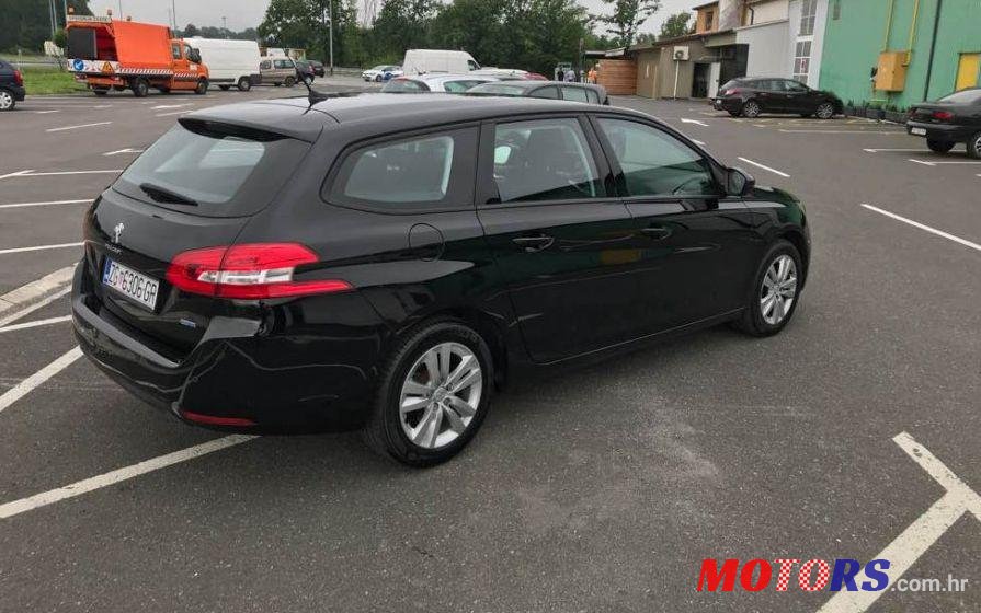 2015' Peugeot 308 Sw photo #1