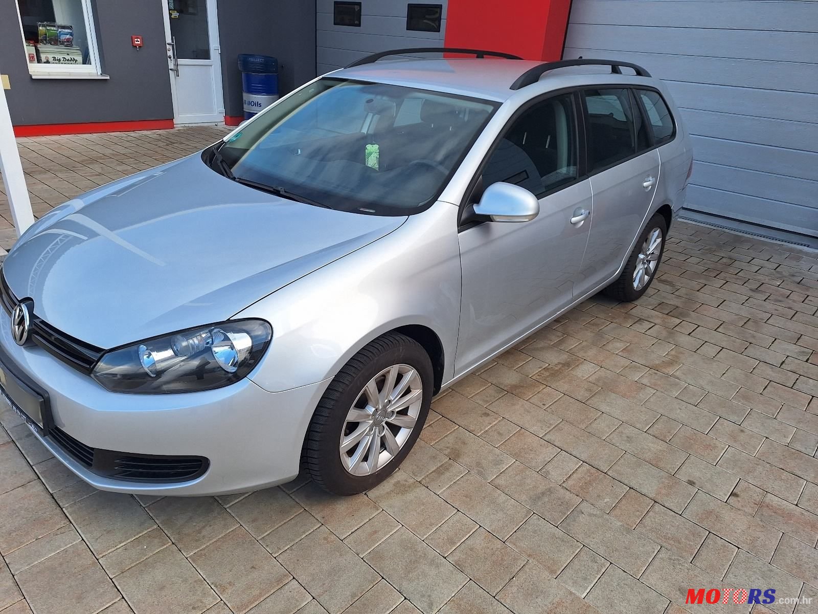 2011' Volkswagen Golf VI Variant photo #2