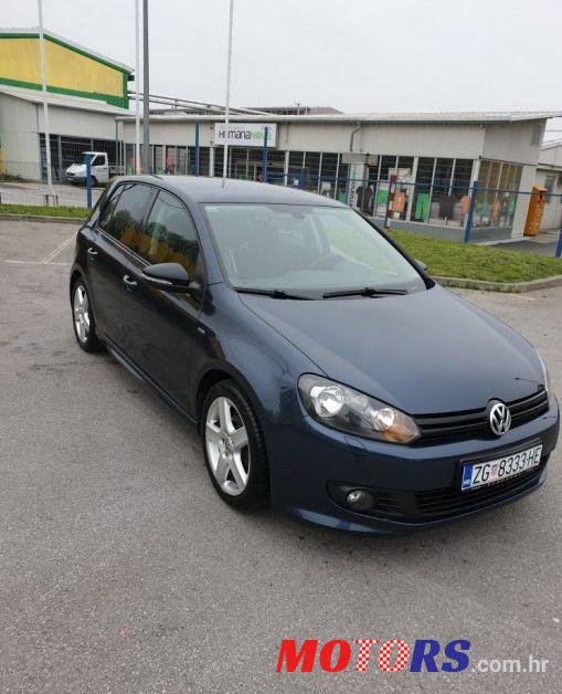 2012' Volkswagen Golf VI 1,6 Tdi photo #1