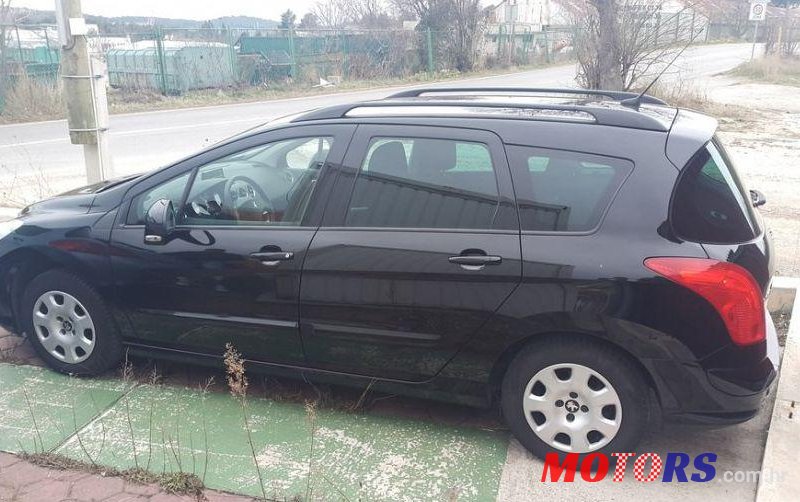 2014' Peugeot 308 Sw 1,6 Hdi photo #1