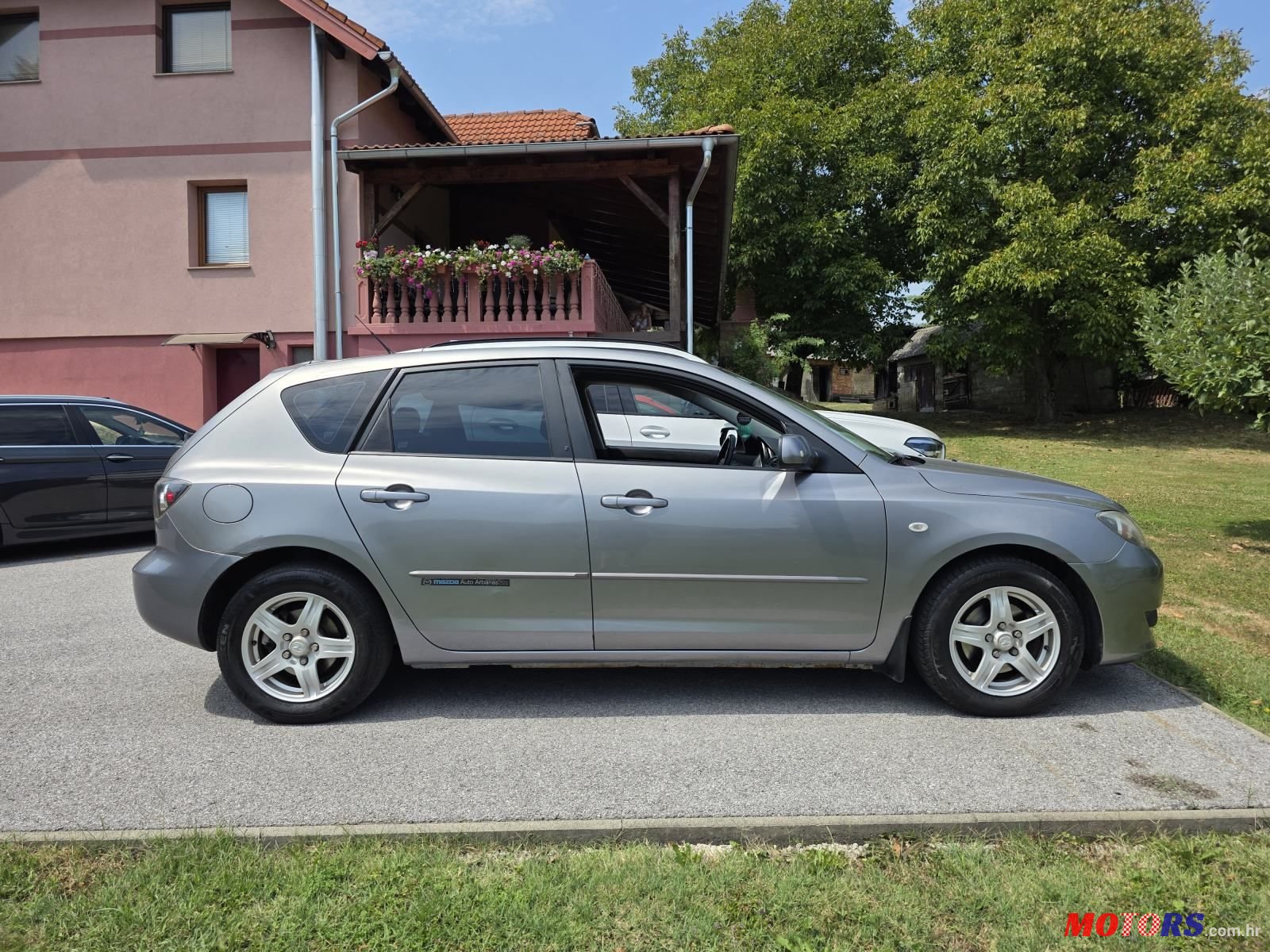 2006' Mazda 3 Sport 1,4 I Ce photo #2