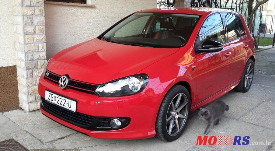 2012' Volkswagen Golf VI 1,6 Tdi photo #1