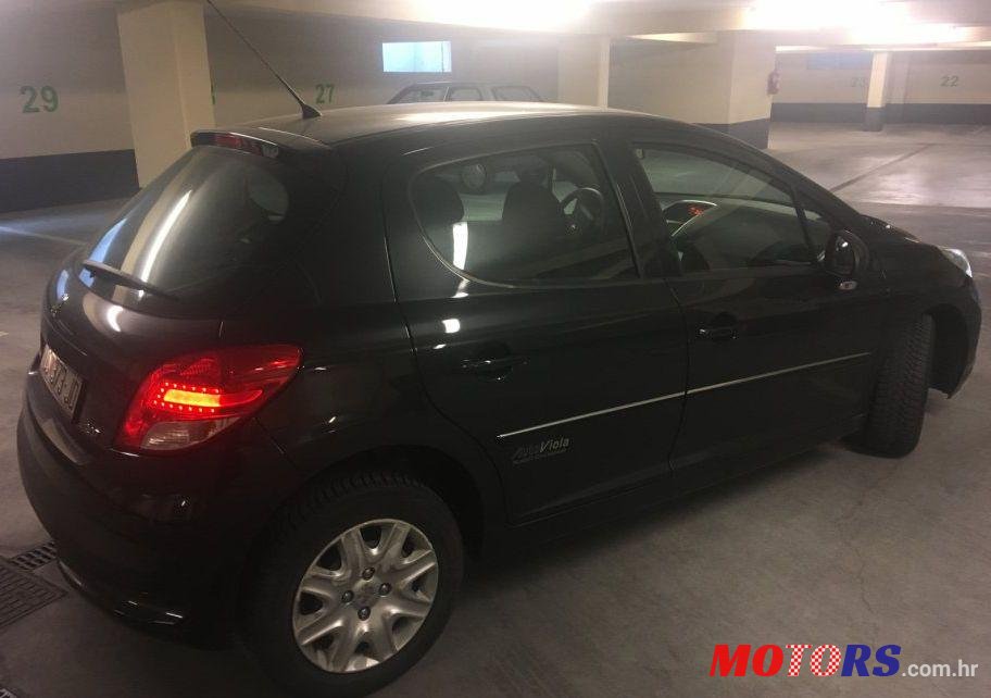 2011' Peugeot 207 1,4 photo #4