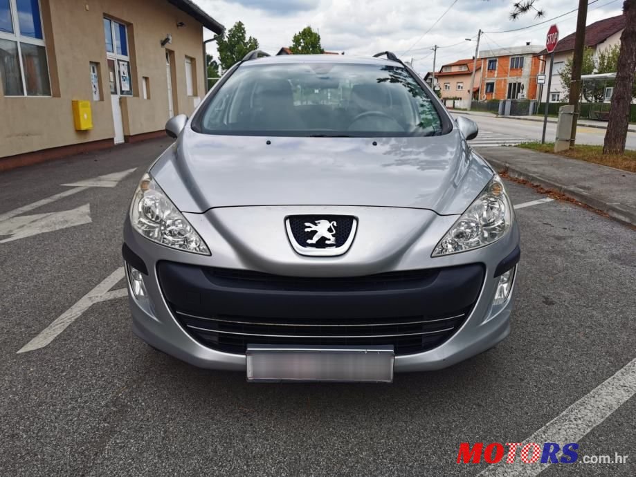 2011' Peugeot 308 Sw photo #2