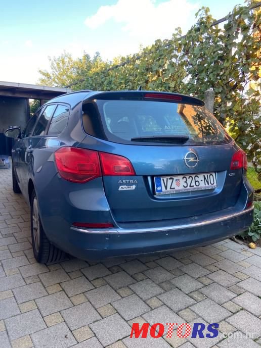 2014' Opel Astra Karavan photo #5