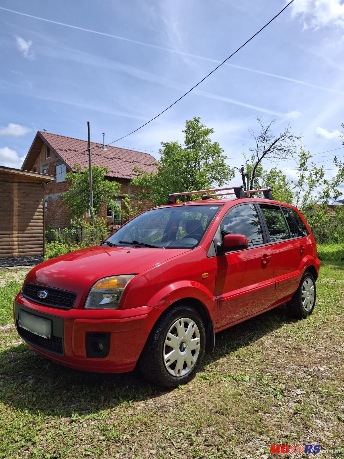 2011' Ford Fusion 1,4 photo #1