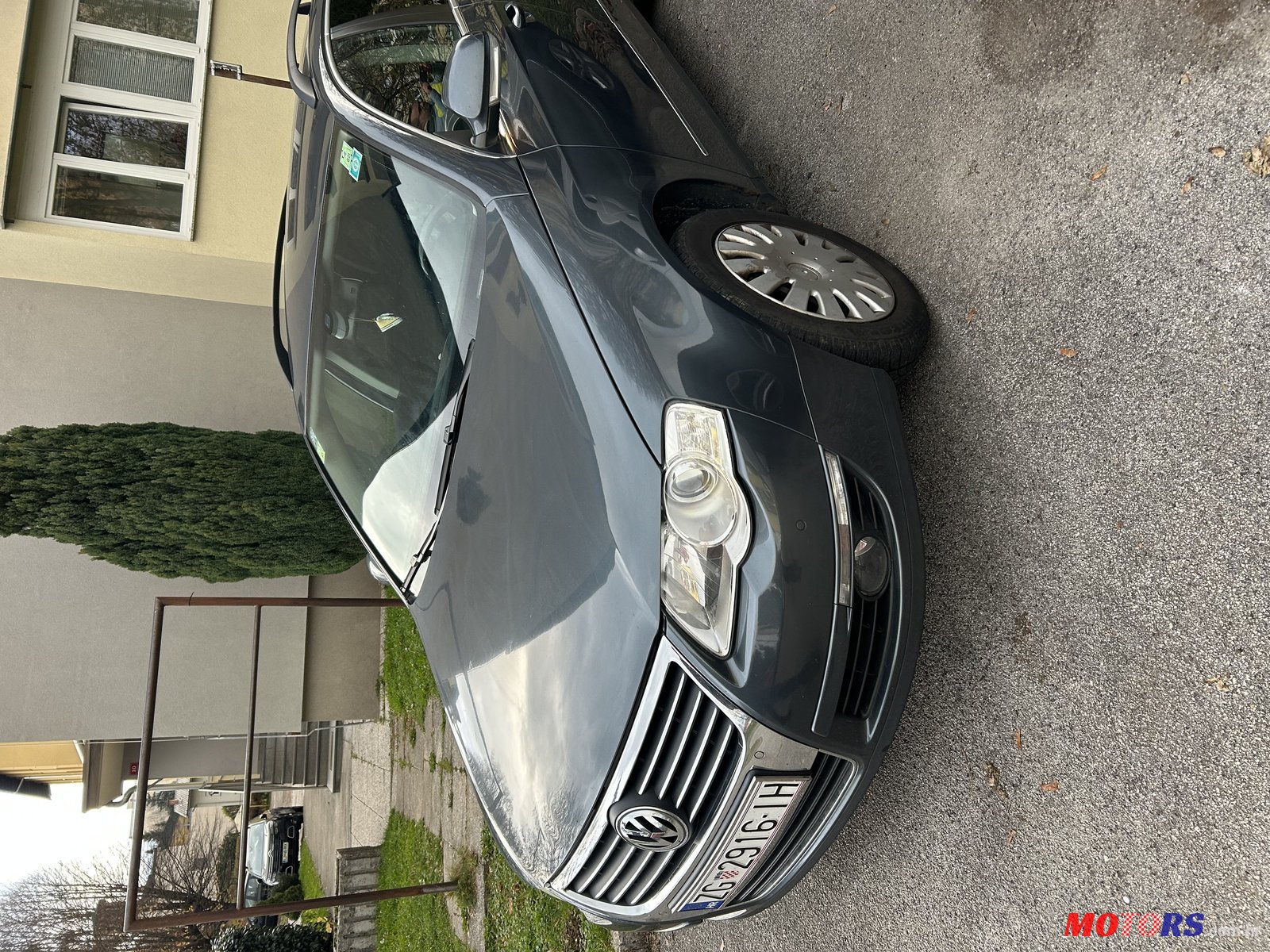 2009' Volkswagen Passat Variant 1.6 TDI photo #2