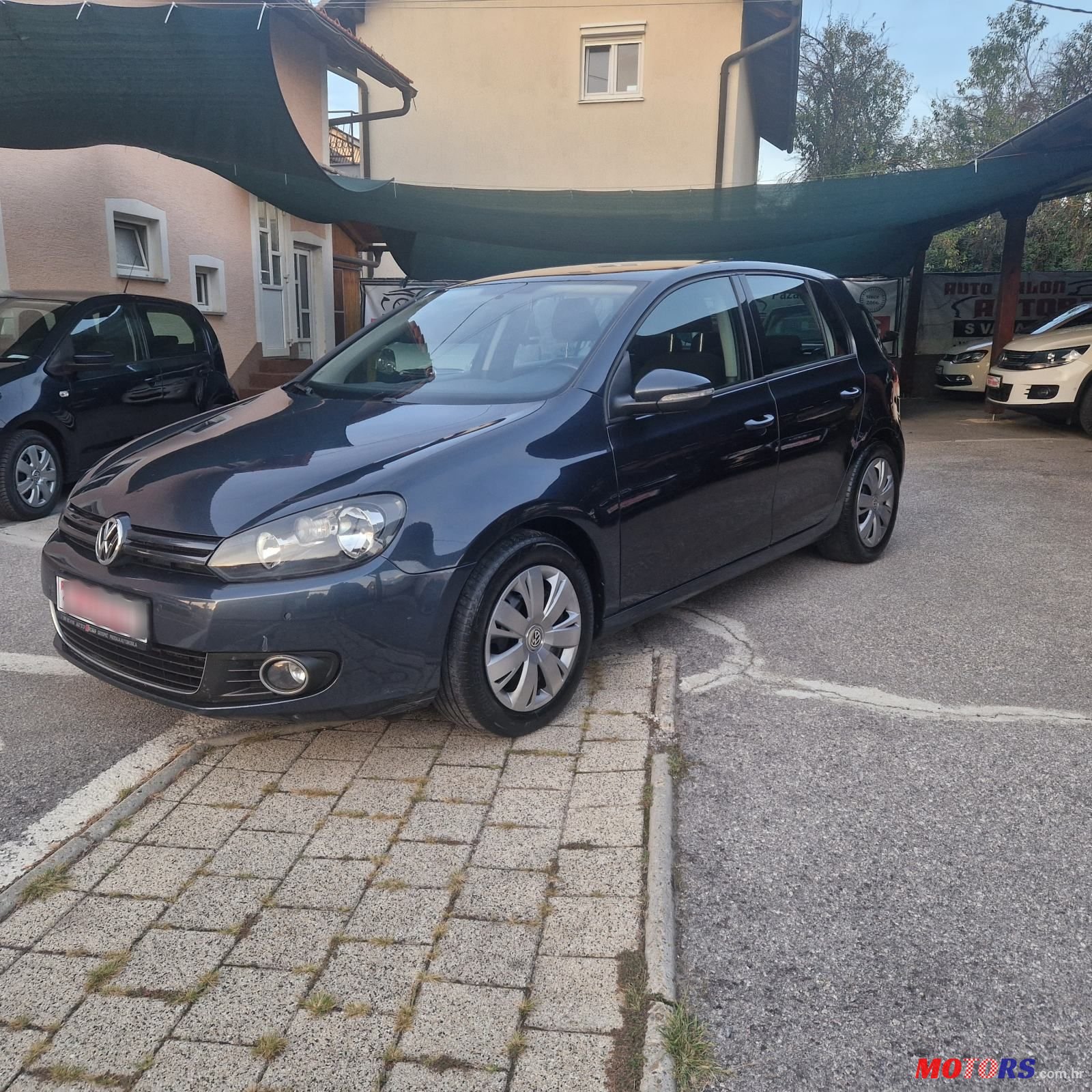 2011' Volkswagen Golf VI 1,6 Tdi photo #3