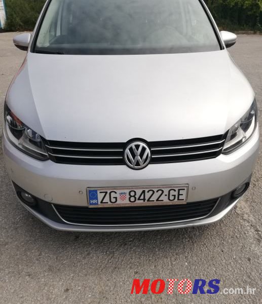 2014' Volkswagen Touran 1,6 Tdi photo #1