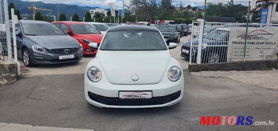 2014' Volkswagen Beetle photo #3